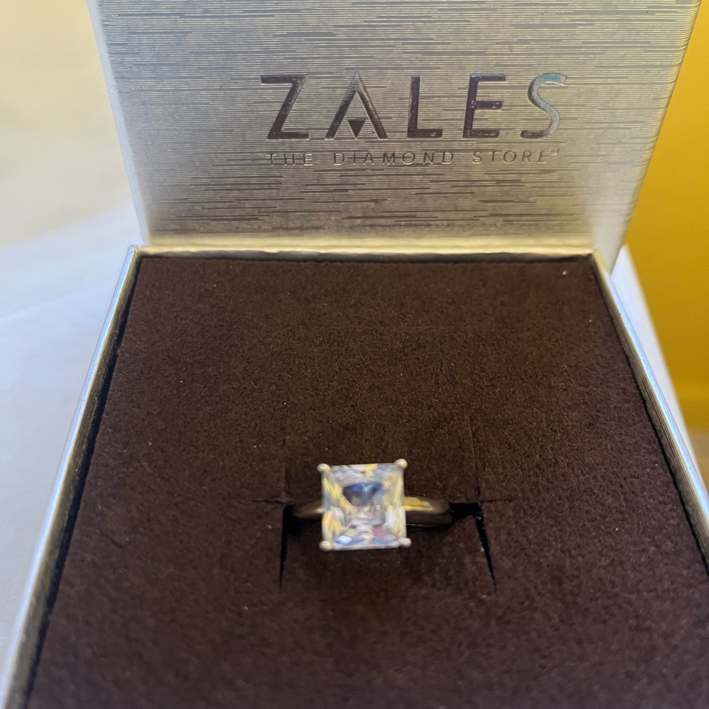 3 ct cz in sterling silver. No stamp. Only worn fir the pics.